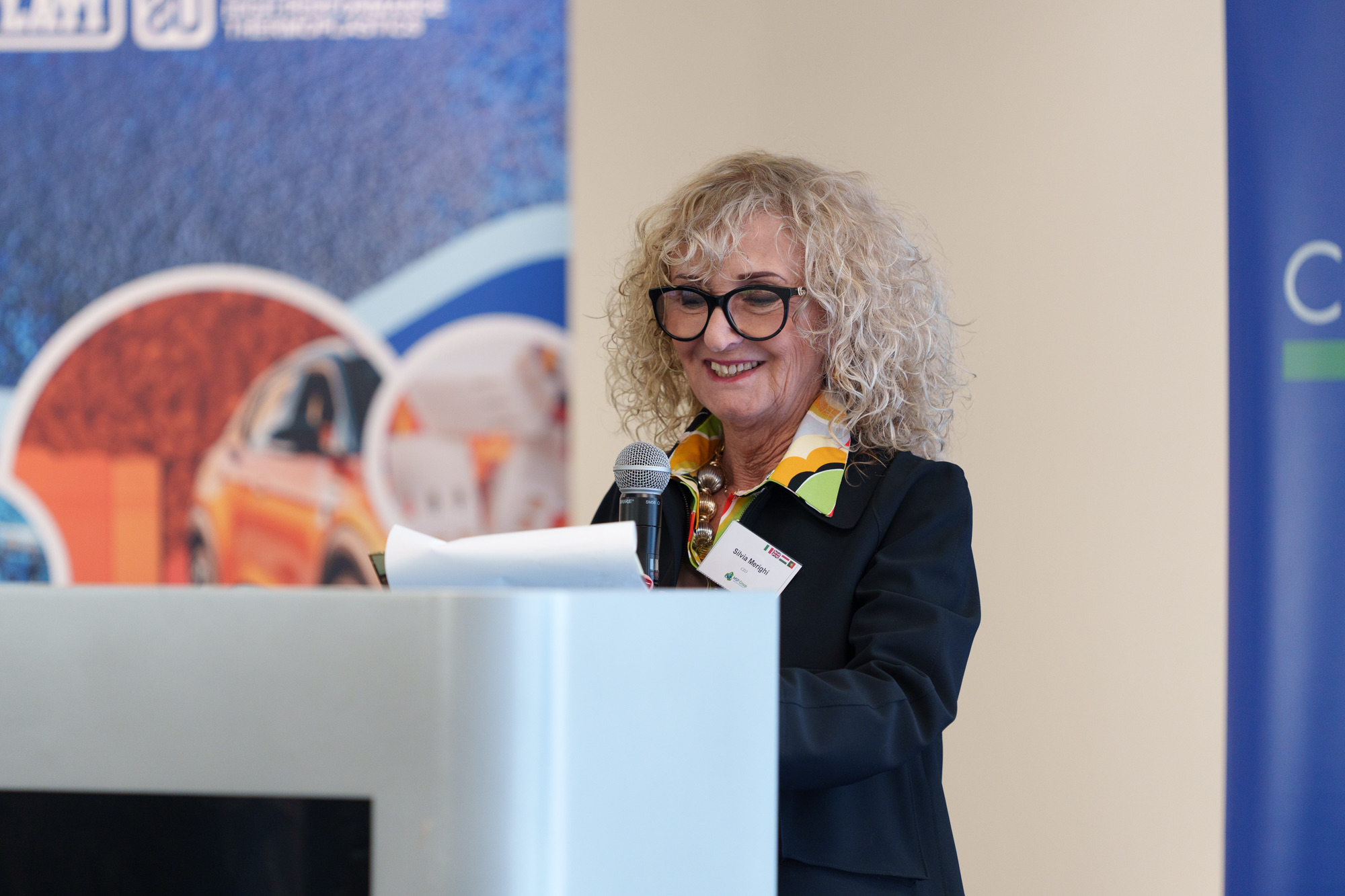 Silvia Merighi addressing the audience, Budapest 2025